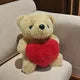Ourson avec bouquet de fleurs